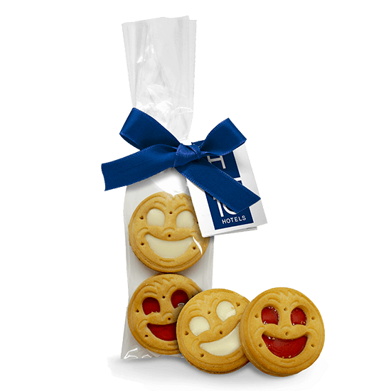 Sachet à ruban avec des biscuits sourire