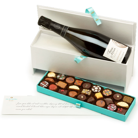 Box with champagne bottle and artisan chocolates