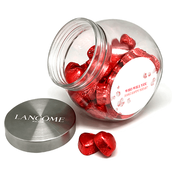 Glass jar with heart shaped chocolates